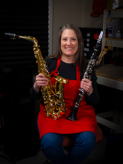 Shawna with an alto sax and clarinet
